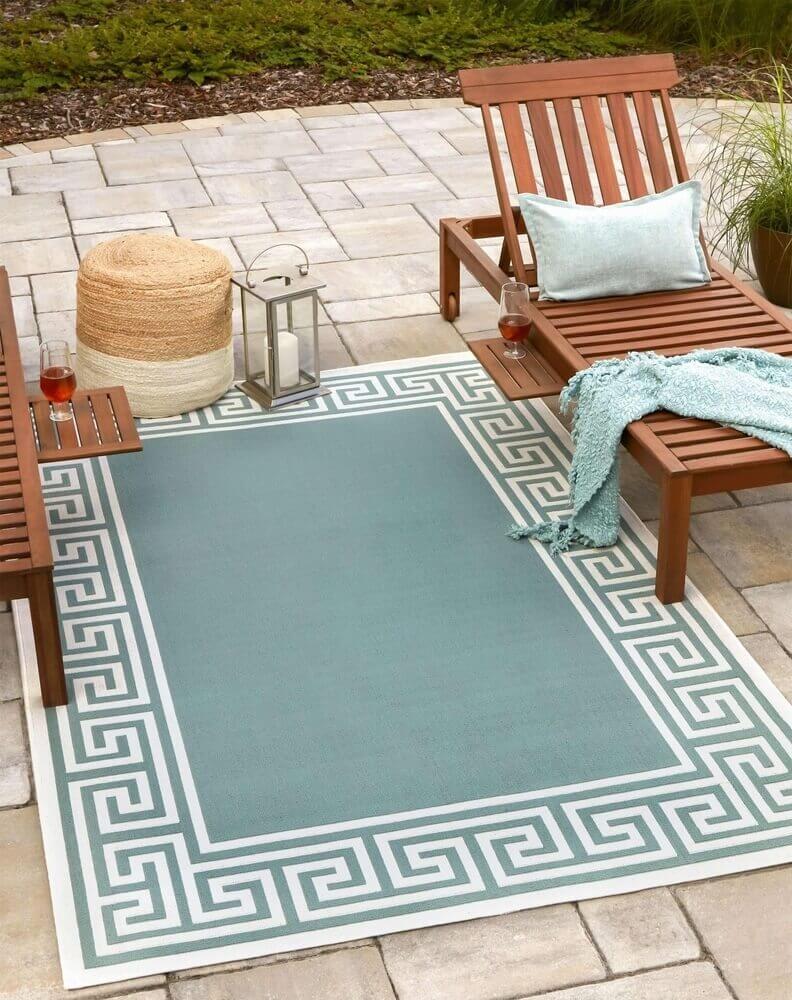 Rug with trendy pattern featured on an outdoor patio in a Sydney home